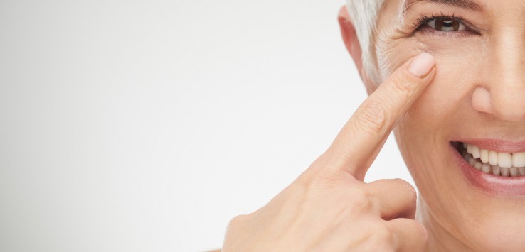 Close up of senior woman showing wrinkles.